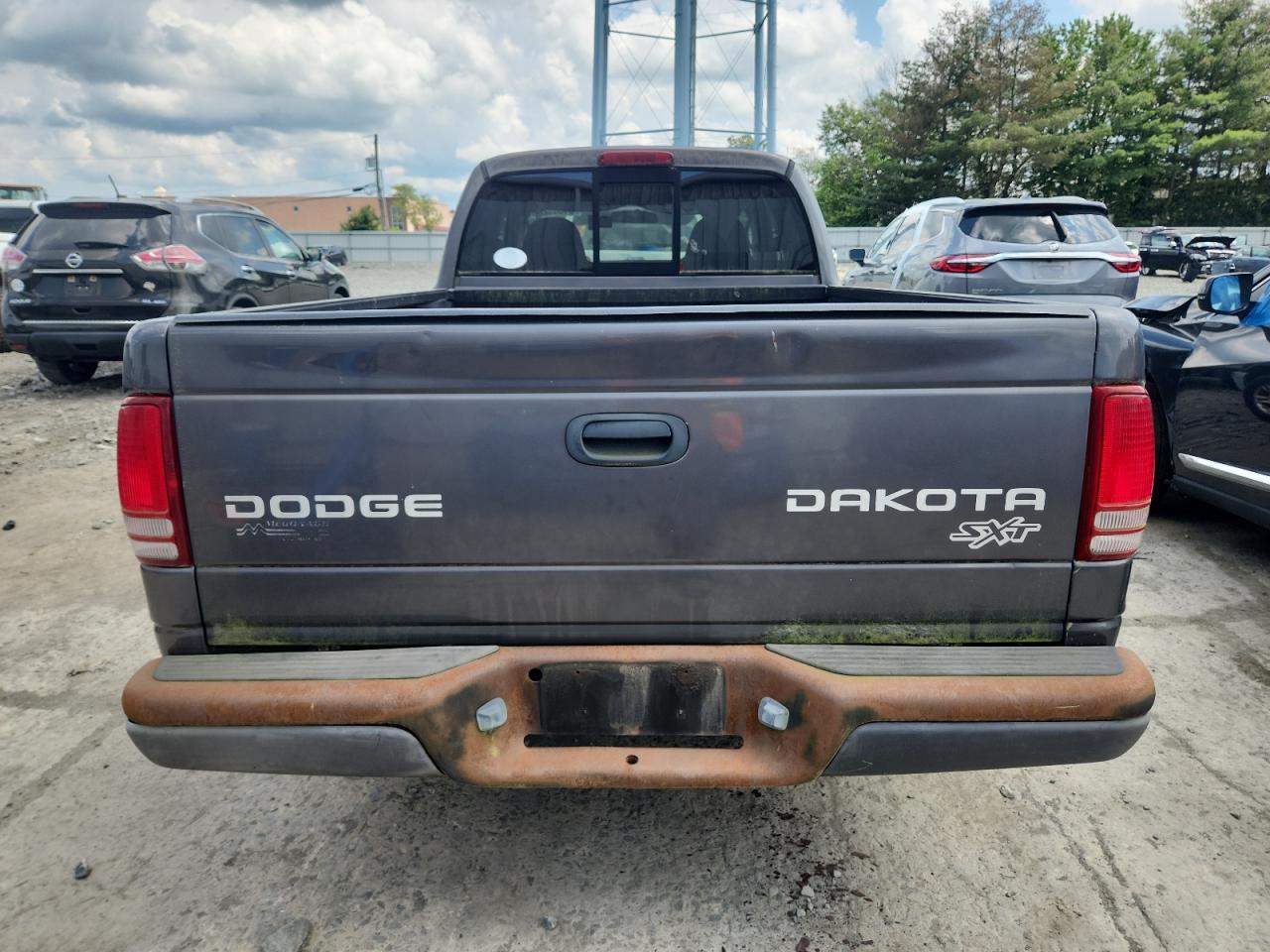 2003 Dodge Dakota Sxt VIN: 1D7HL12X23S100979 Lot: 64883235