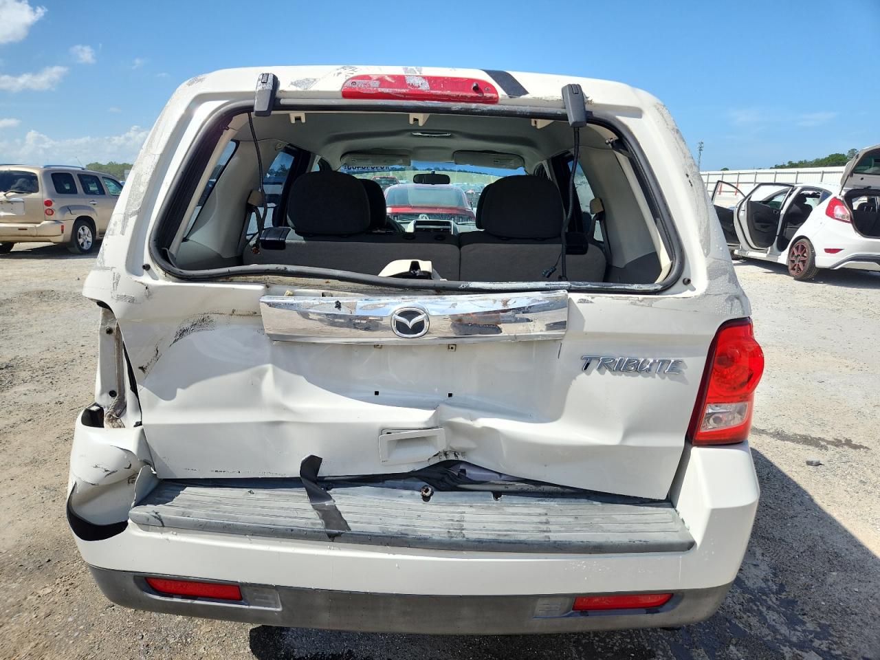 2011 Mazda Tribute I VIN: 4F2CY0C78BKM07277 Lot: 64648405