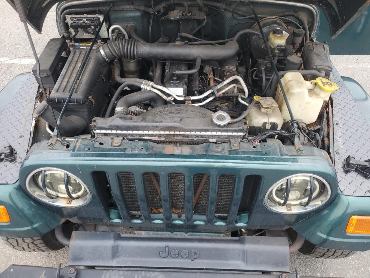 2001 Jeep Wrangler / Tj Sahara VIN: 1J4FA59S21P349009 Lot: 64310995