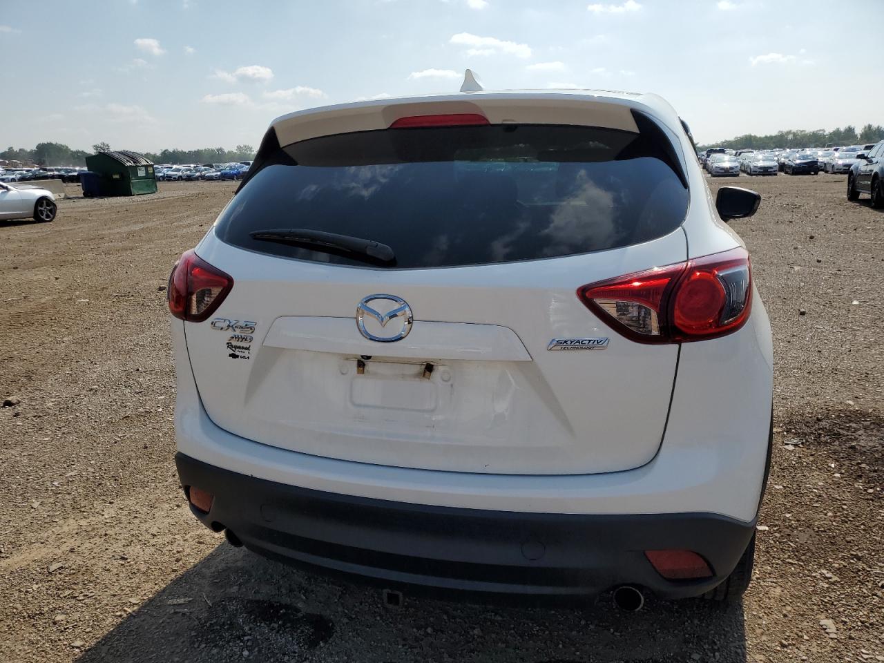 2014 Mazda Cx-5 Touring VIN: JM3KE4CYXE0321027 Lot: 64651985