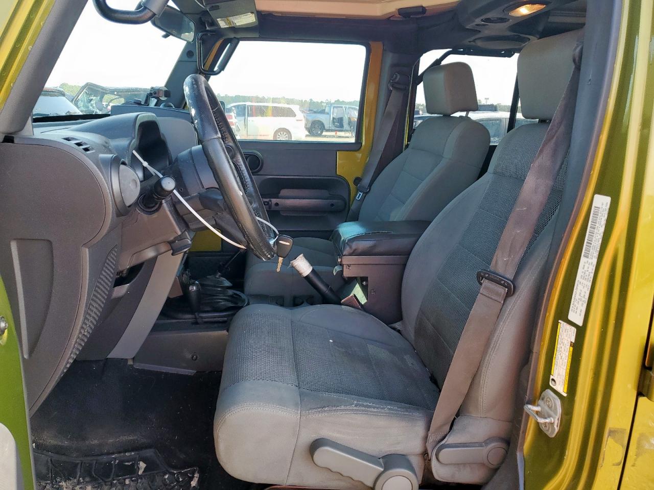 2007 Jeep Wrangler Sahara VIN: 1J4GA59157L152251 Lot: 64802375