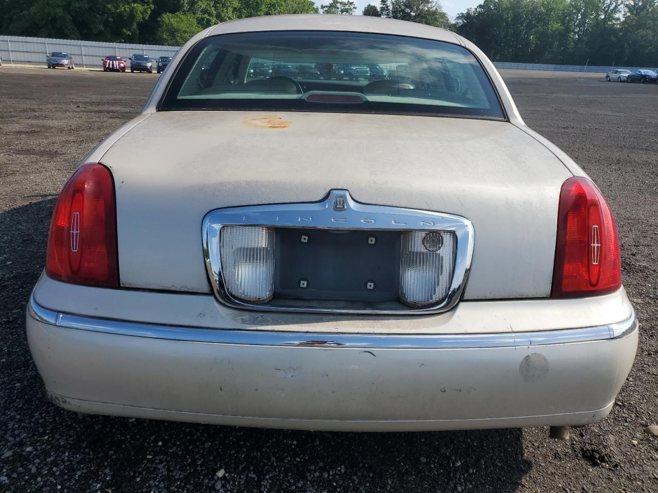 1999 Lincoln Town Car Cartier VIN: 1LNHM83W7XY605873 Lot: 64357805