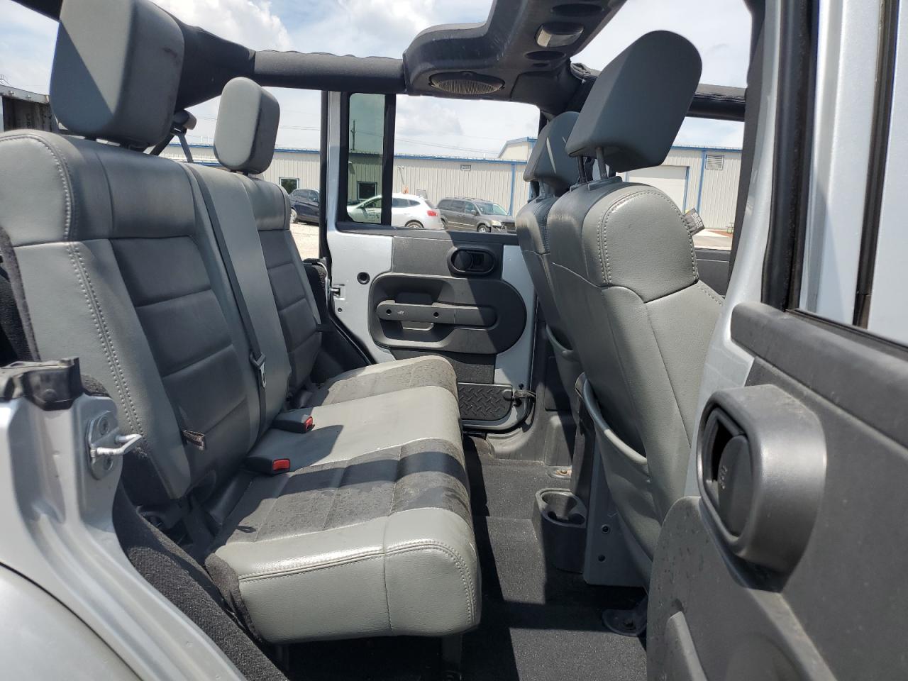 2010 Jeep Wrangler Unlimited Sahara VIN: 1J4HA5H18AL180445 Lot: 64086195