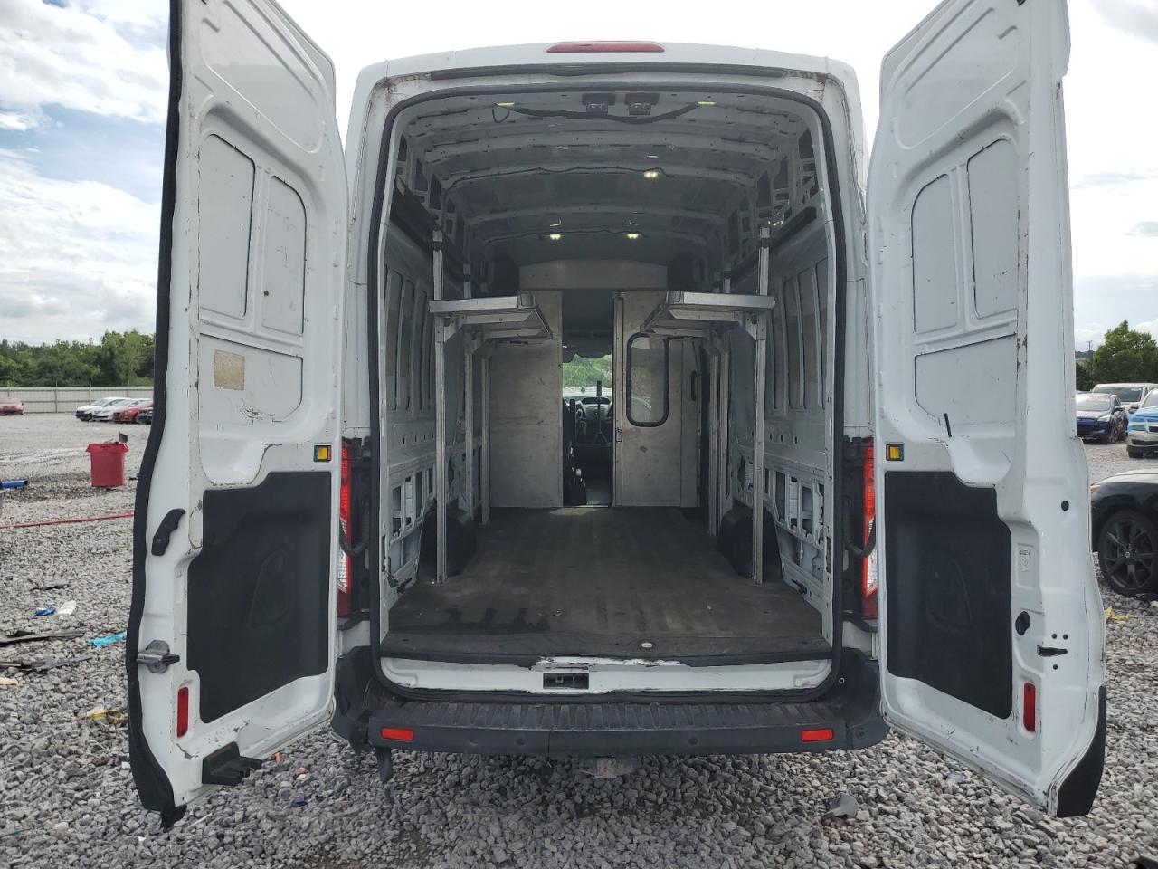 2015 Ford Transit Cargo Van T- VIN: 1FTSW3XM7FKB09943 Lot: 64839725