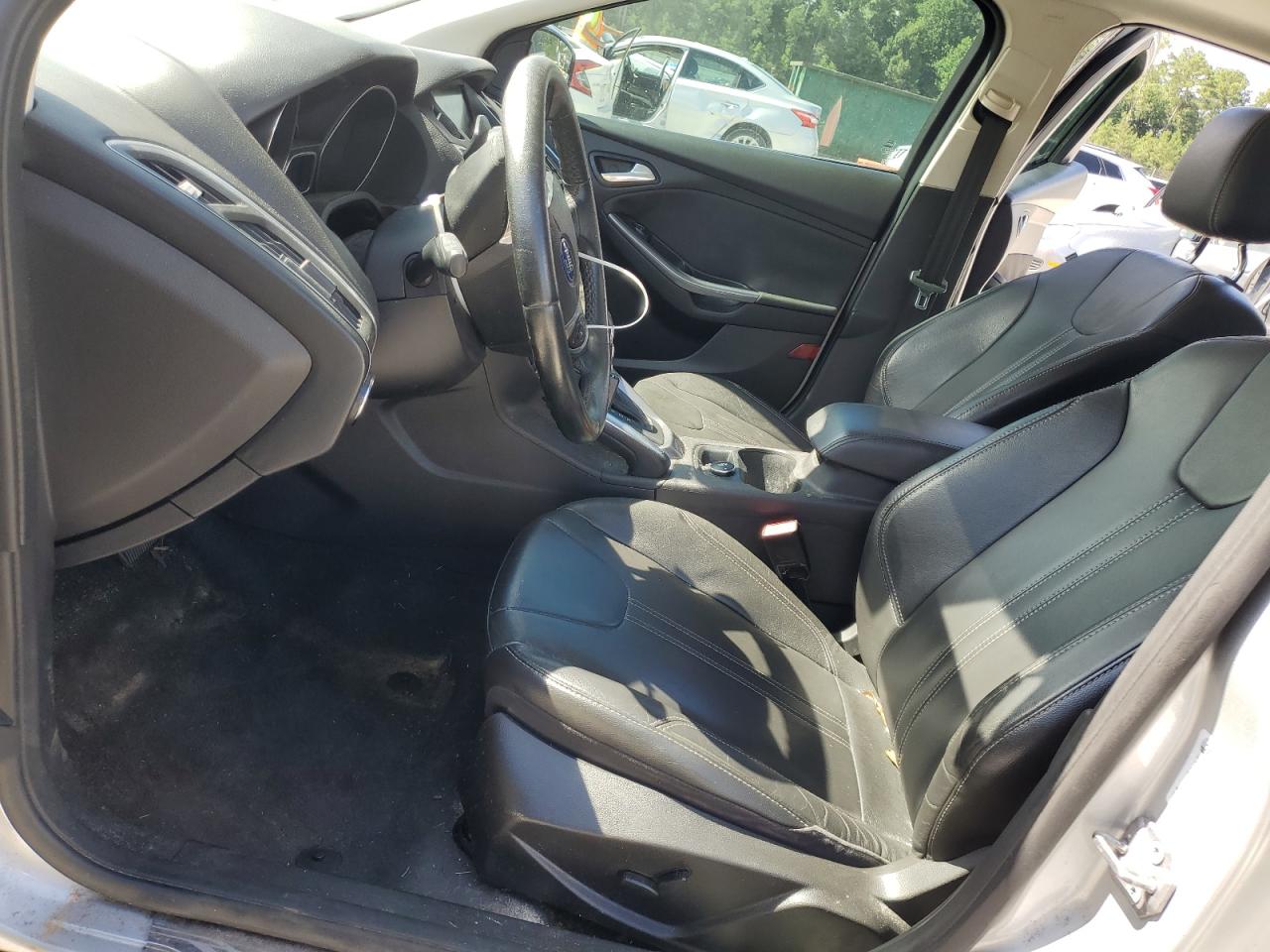 2012 Ford Focus Titanium VIN: 1FAHP3J25CL213938 Lot: 65078405