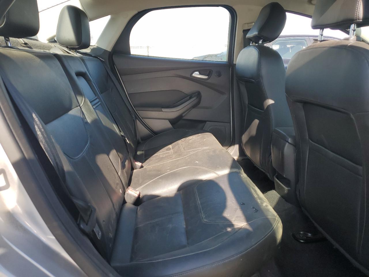 2015 Ford Focus Titanium VIN: 1FADP3J29FL269772 Lot: 63290225