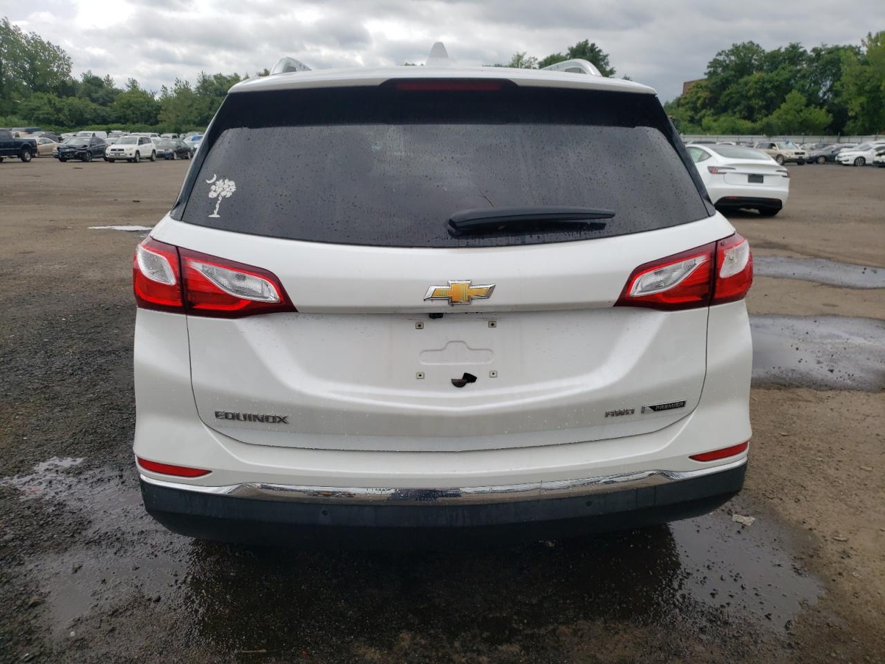 2018 Chevrolet Equinox Premier VIN: 2GNAXVEV6J6306010 Lot: 64092035
