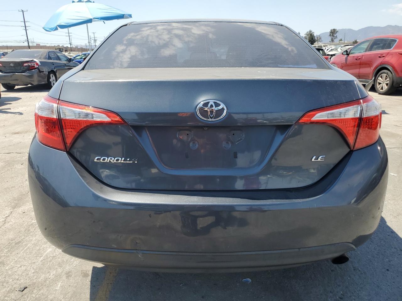 2016 Toyota Corolla L VIN: 5YFBURHEXGP458761 Lot: 65032305