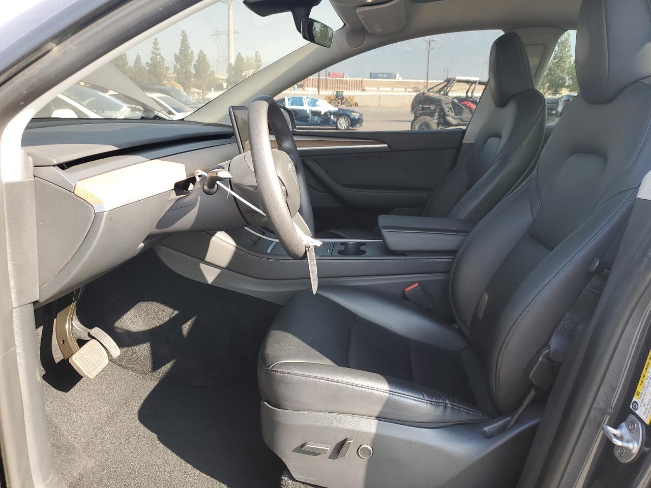 2023 Tesla Model Y VIN: 7SAYGDEE4PA057484 Lot: 64216455