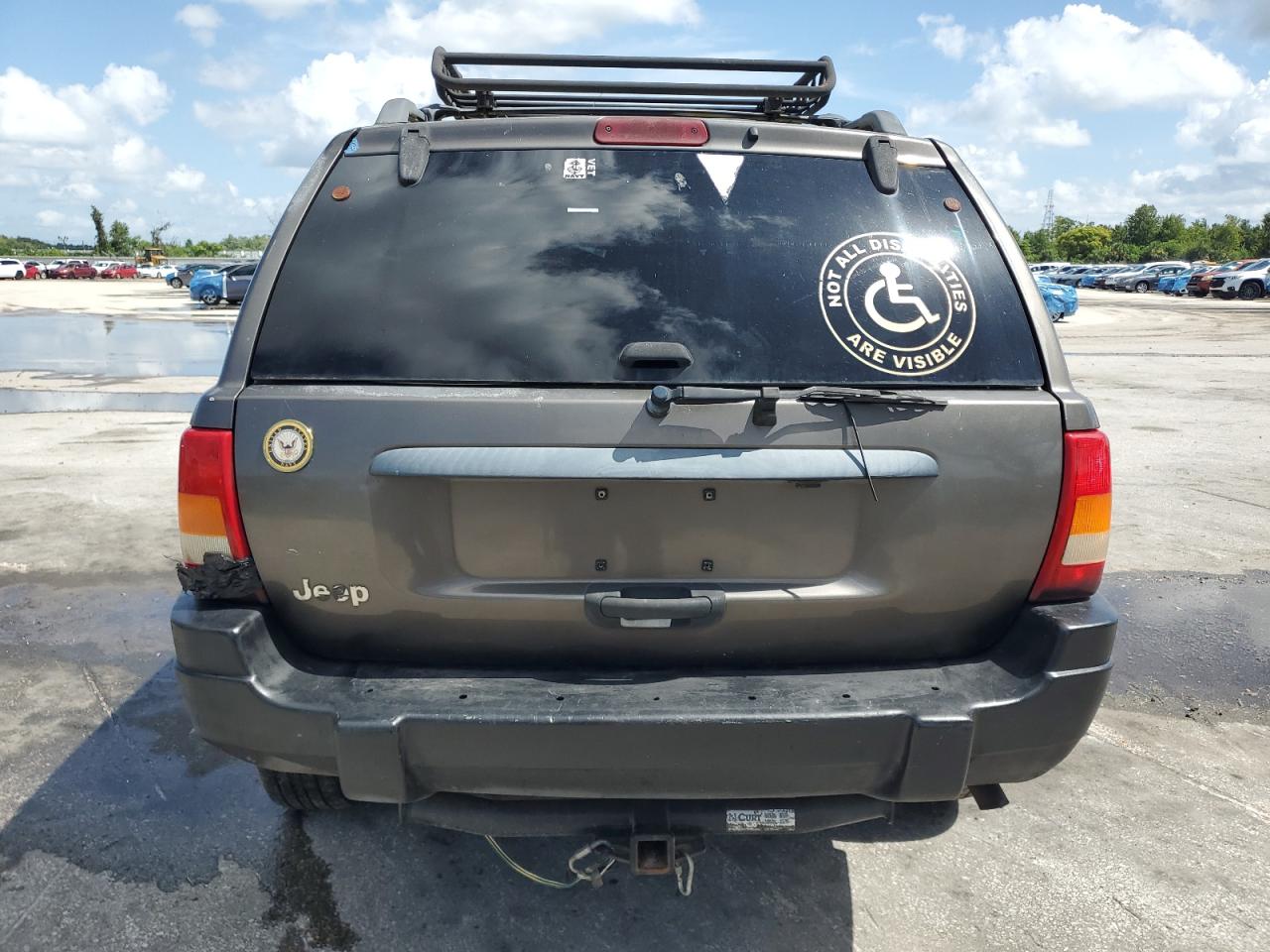 2000 Jeep Grand Cherokee Laredo VIN: 1J4G248S0YC275698 Lot: 64992755