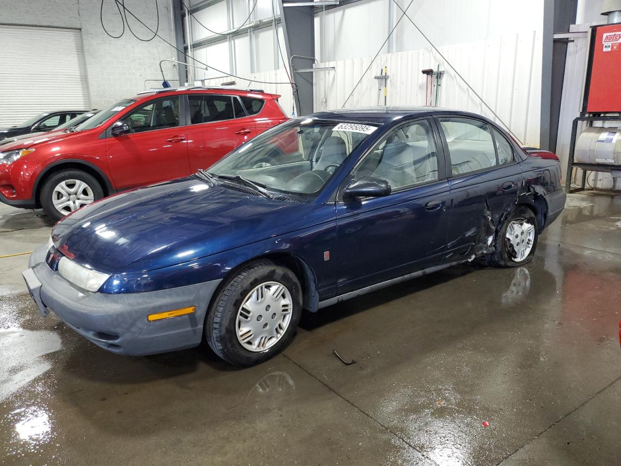 1999 Saturn Sl1 VIN: 1G8ZG5281XZ329776 Lot: 63295095