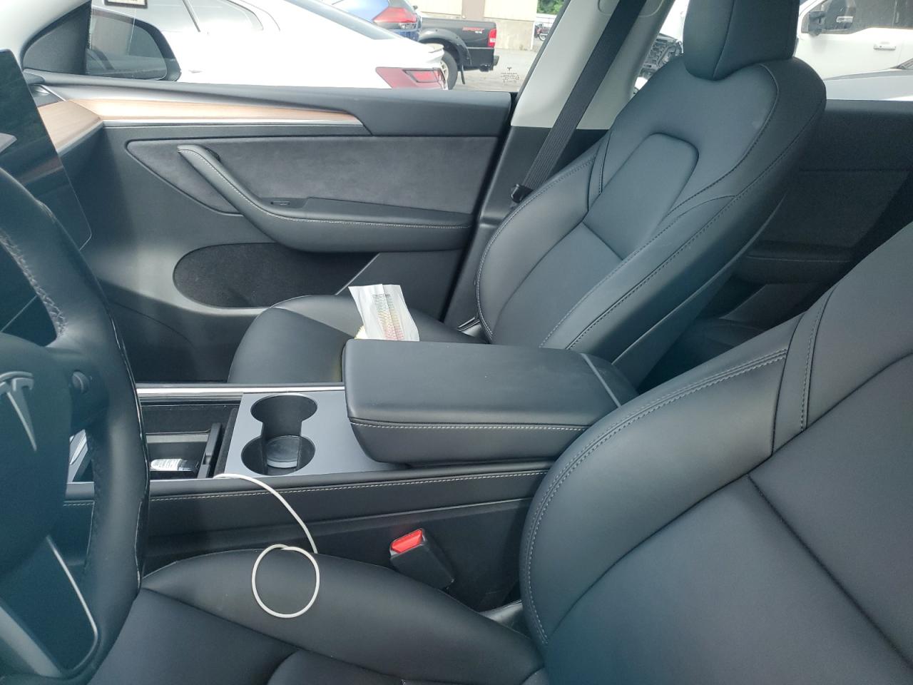 2023 Tesla Model Y VIN: 7SAYGDEF7PF860057 Lot: 63240105