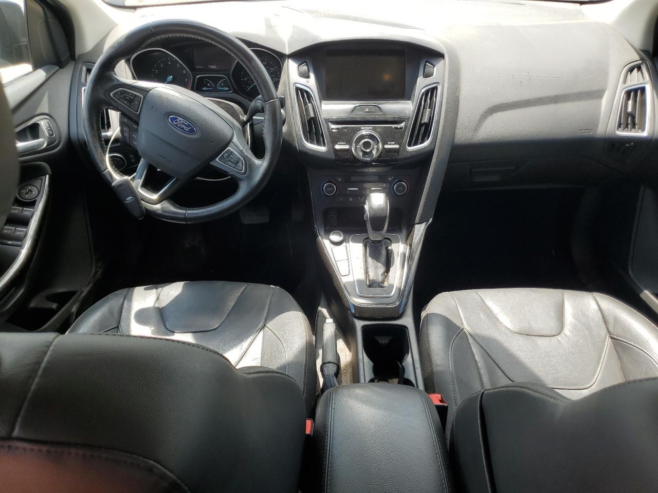 2015 Ford Focus Titanium VIN: 1FADP3J29FL293280 Lot: 65243455