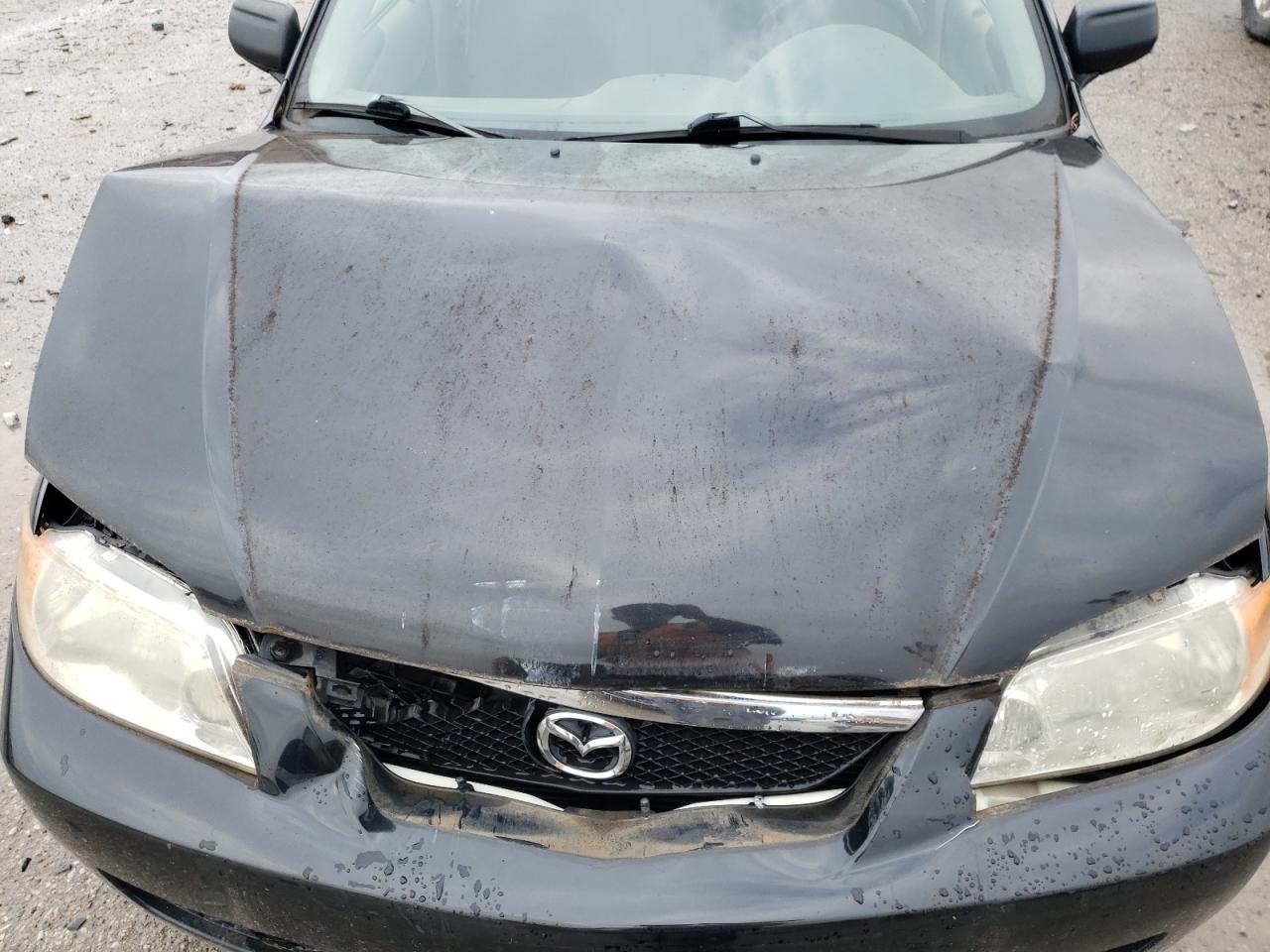 2001 Mazda Protege Dx VIN: JM1BJ222010414736 Lot: 65020415
