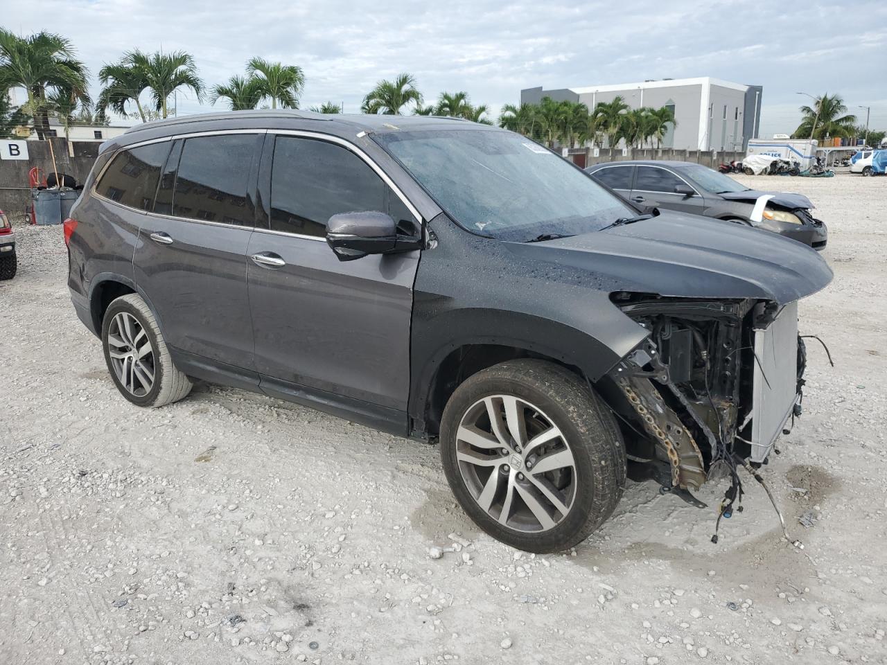 2017 Honda Pilot Touring VIN: 5FNYF5H94HB011565 Lot: 63282635