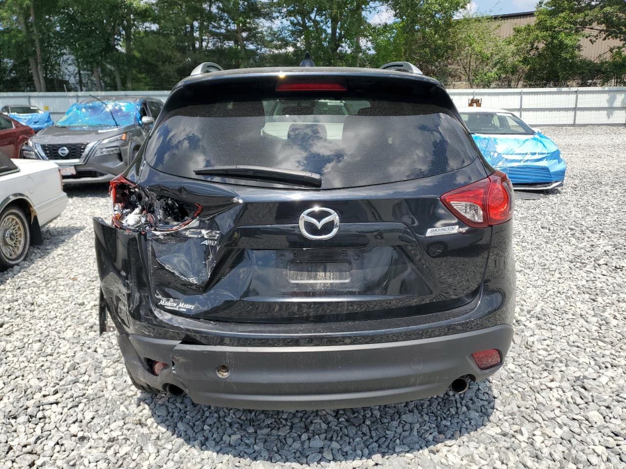 2013 Mazda Cx-5 Touring VIN: JM3KE4CE2D0165439 Lot: 64735005