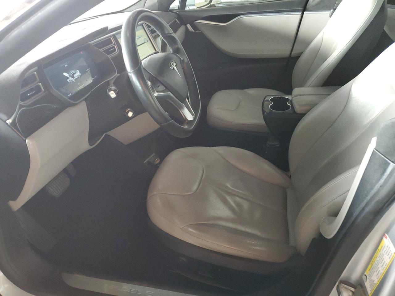 2014 Tesla Model S VIN: 5YJSA1H19EFP61319 Lot: 64798375