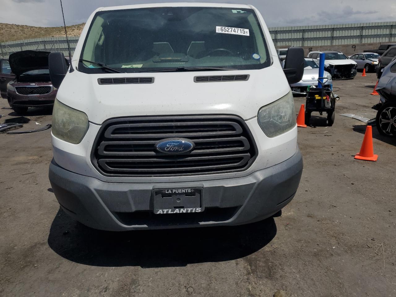 2015 Ford Transit T-150 VIN: 1FTNE1ZM1FKA90890 Lot: 65274715