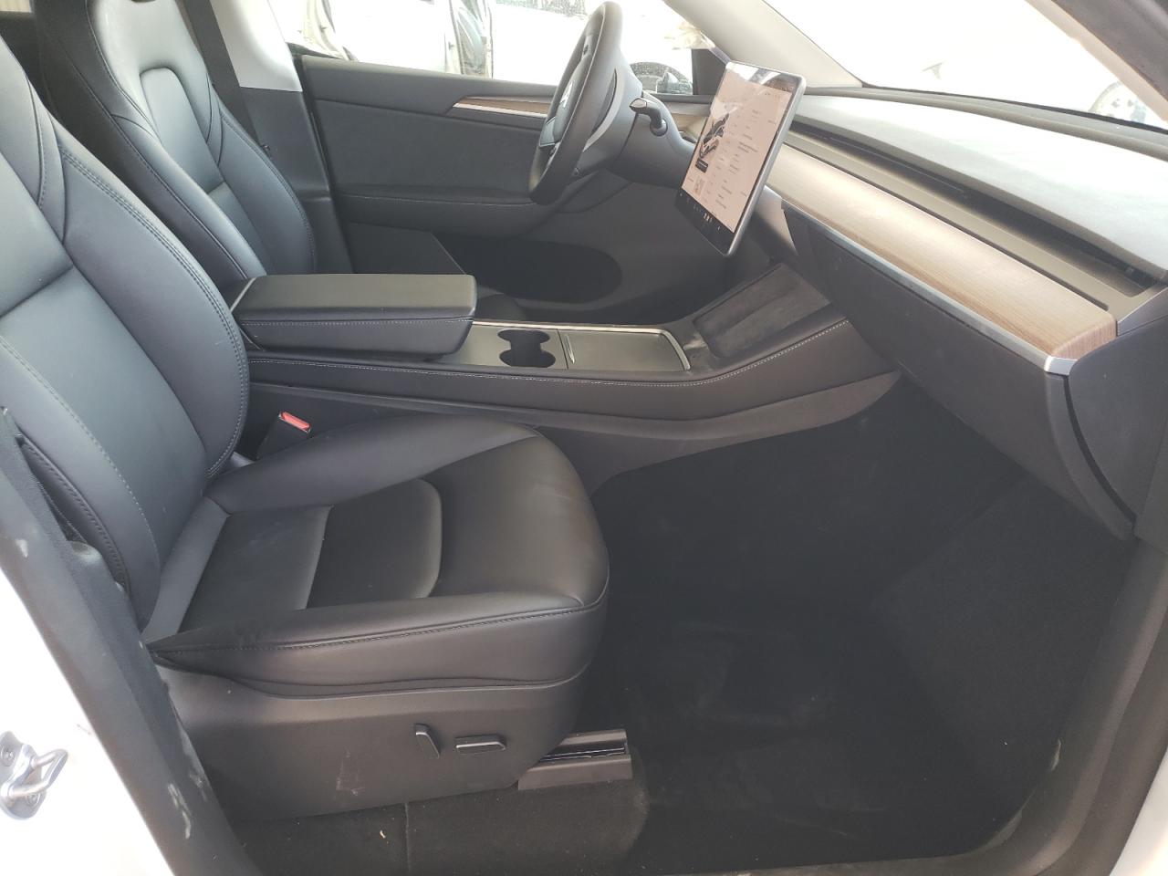 2023 Tesla Model Y VIN: 7SAYGDEE0PF812021 Lot: 64625425