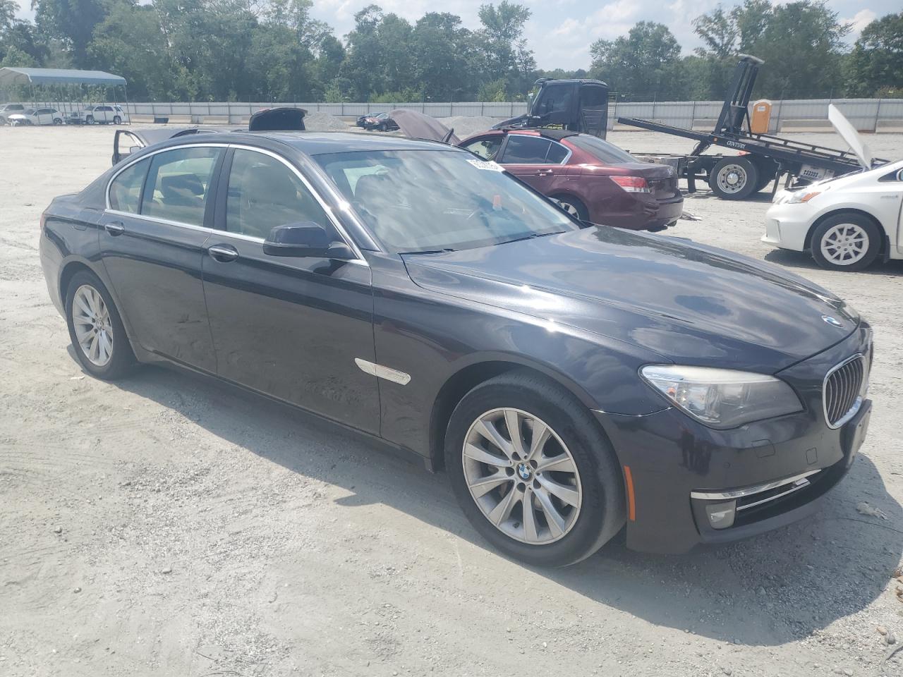 2014 BMW 740 I VIN: WBAYA6C58ED826649 Lot: 66338525