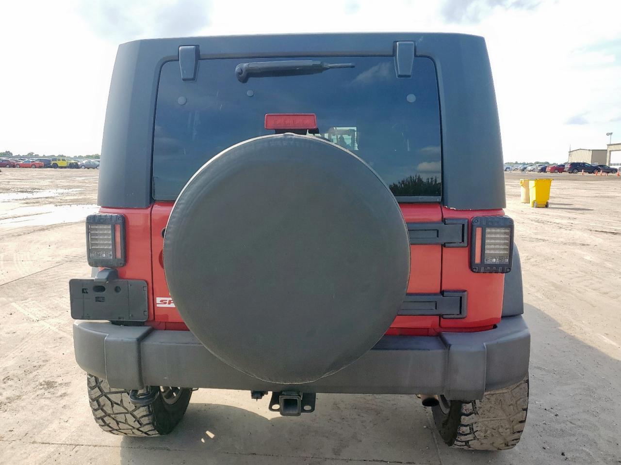 2010 Jeep Wrangler Unlimited Sport VIN: 1J4HB3H17AL232245 Lot: 64742695