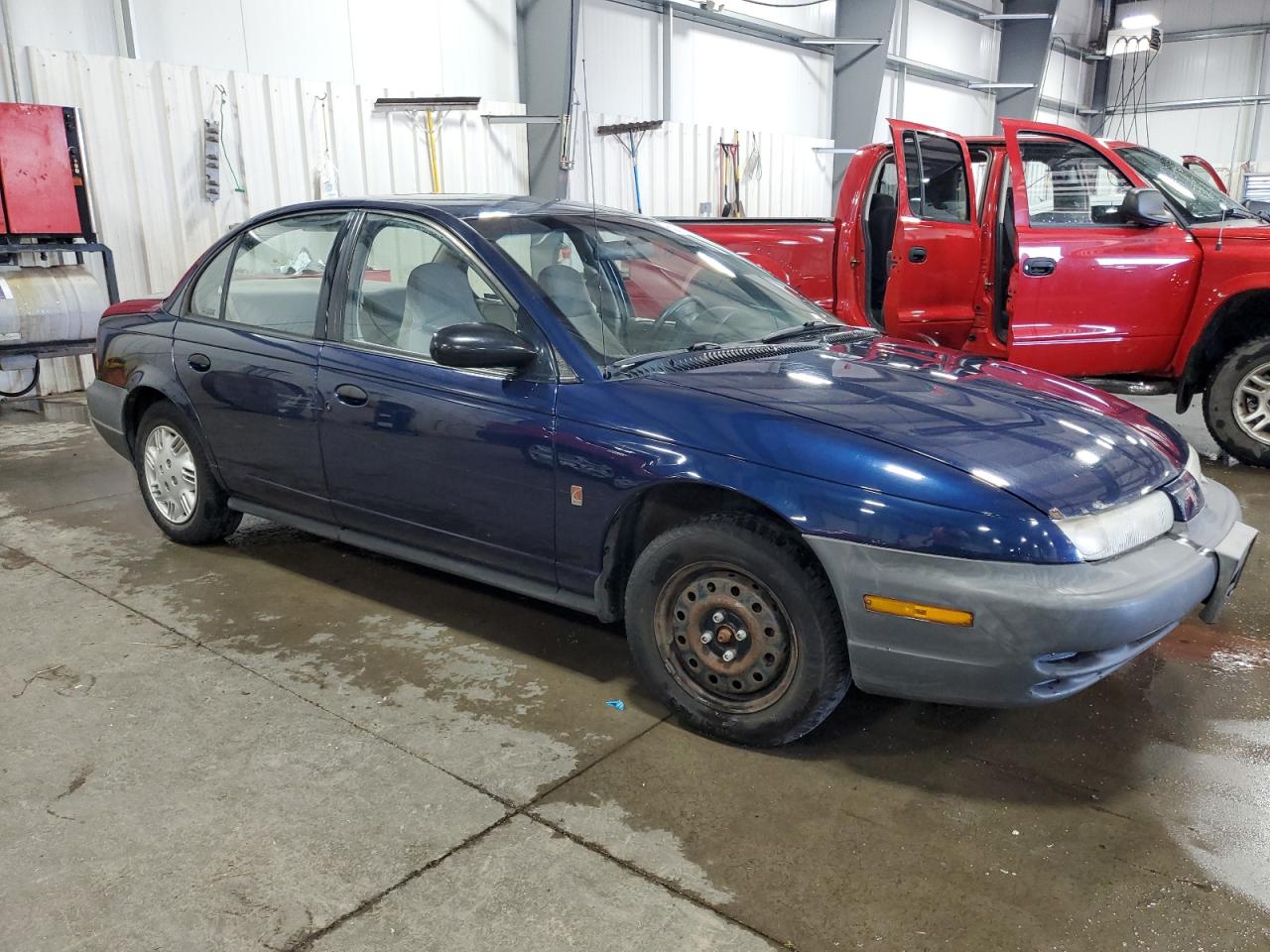 1999 Saturn Sl1 VIN: 1G8ZG5281XZ329776 Lot: 63295095