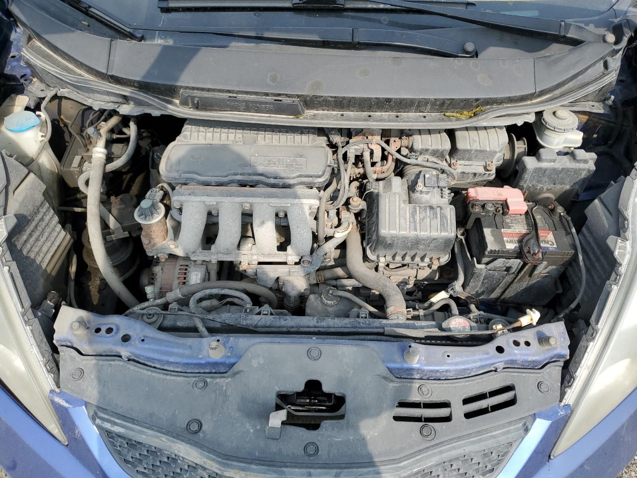 2010 Honda Fit Lx VIN: JHMGE8H58AC803037 Lot: 64092015