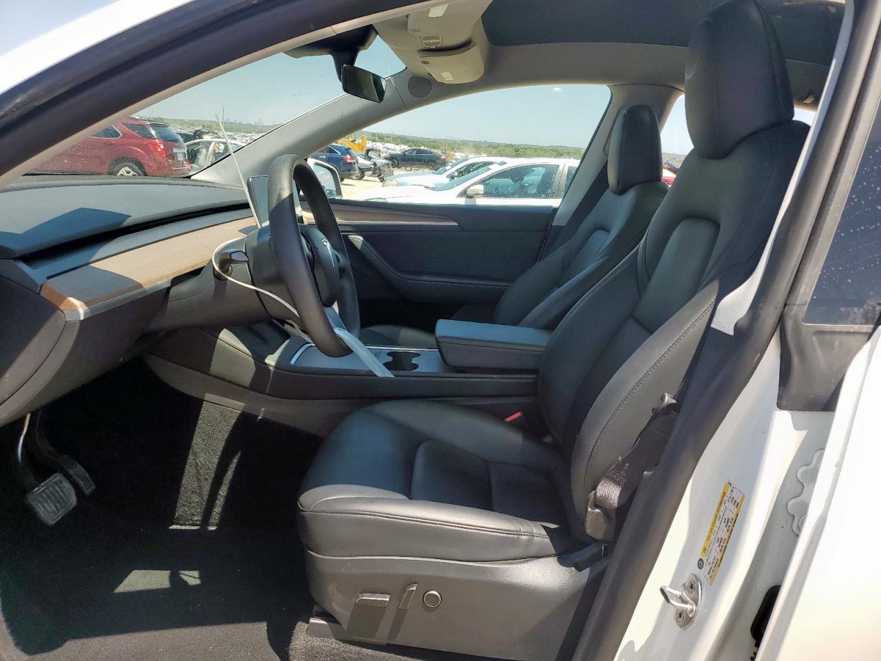 2023 Tesla Model Y VIN: 7SAYGDEE6PA130256 Lot: 65733695