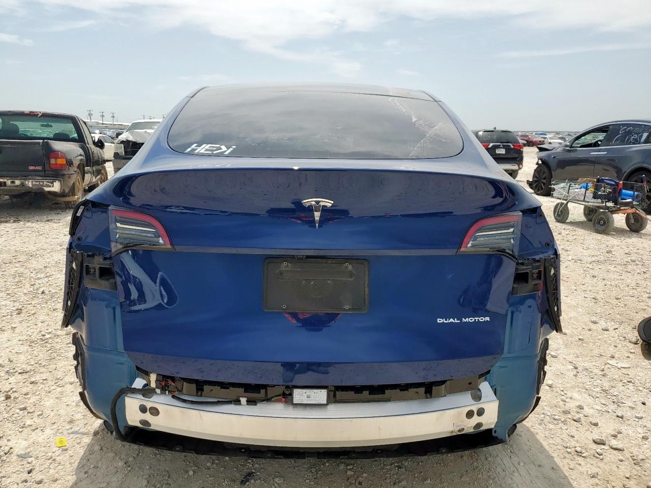2024 Tesla Model Y VIN: 7SAYGDEE7RA295879 Lot: 63751145