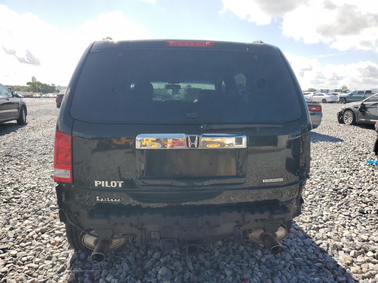 2011 Honda Pilot Touring VIN: 5FNYF3H93BB010709 Lot: 62604055