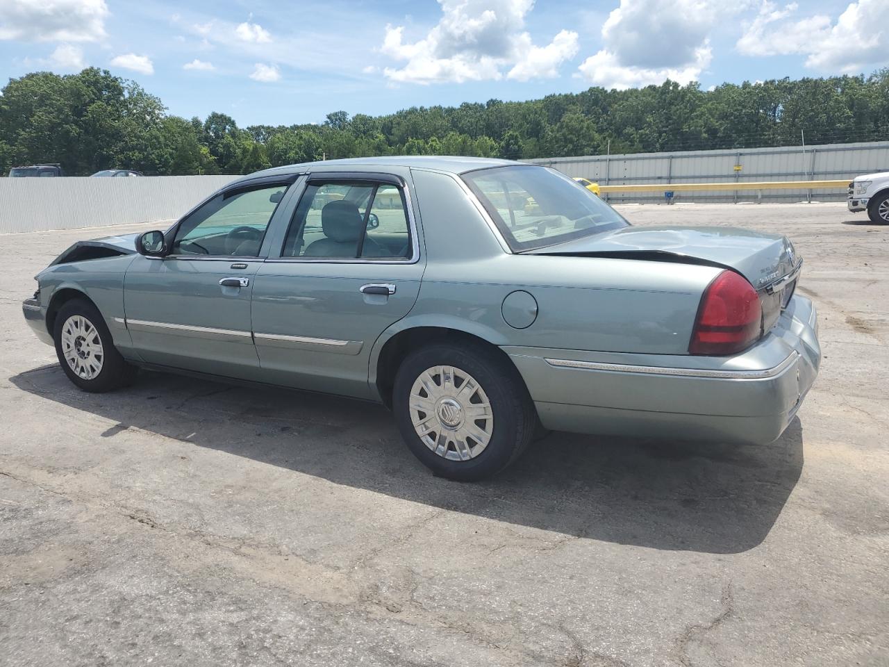2006 Mercury Grand Marquis Gs VIN: 2MEFM74V16X613542 Lot: 64176385