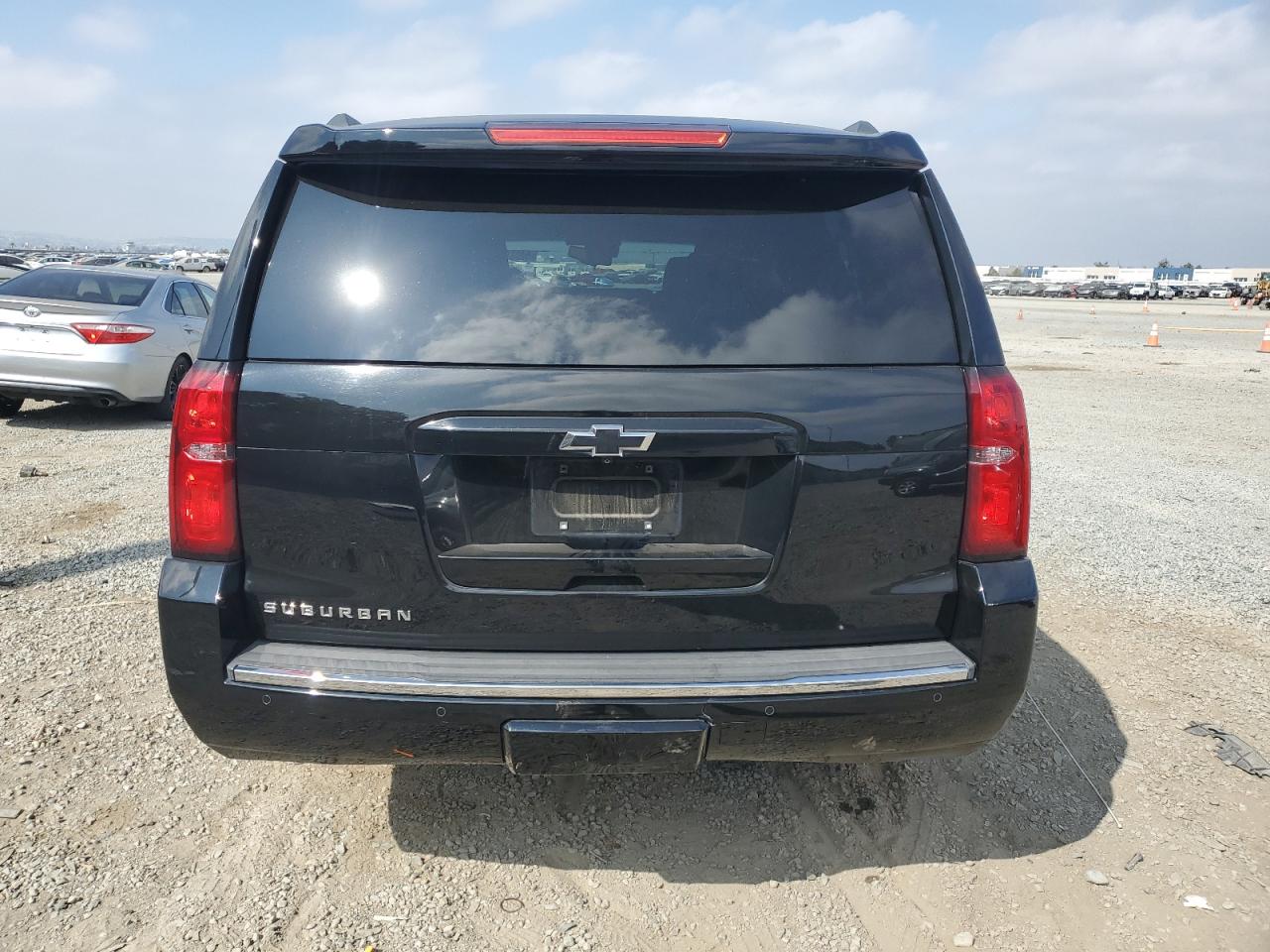 2015 Chevrolet Suburban C1500 Ltz VIN: 1GNSCKKC0FR748570 Lot: 64889425