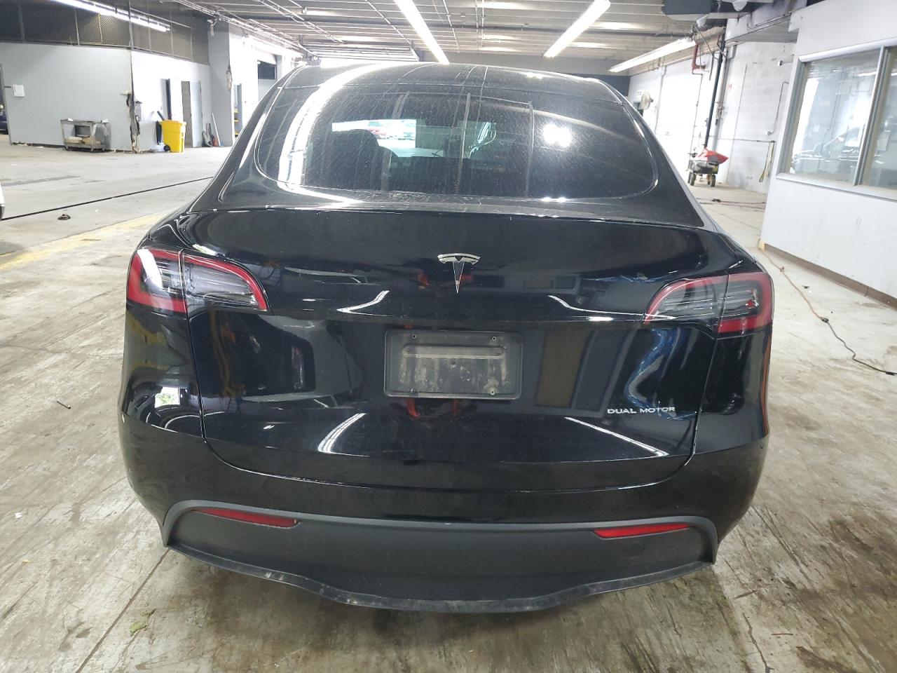 2023 Tesla Model Y VIN: 7SAYGDEE4PA042256 Lot: 66559935