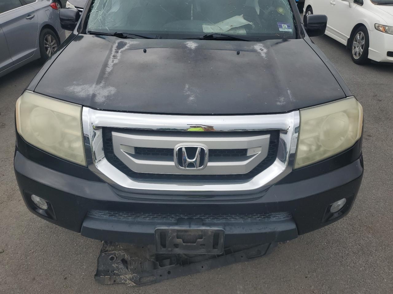 2011 Honda Pilot Exl VIN: 5FNYF4H5XBB057674 Lot: 64407805