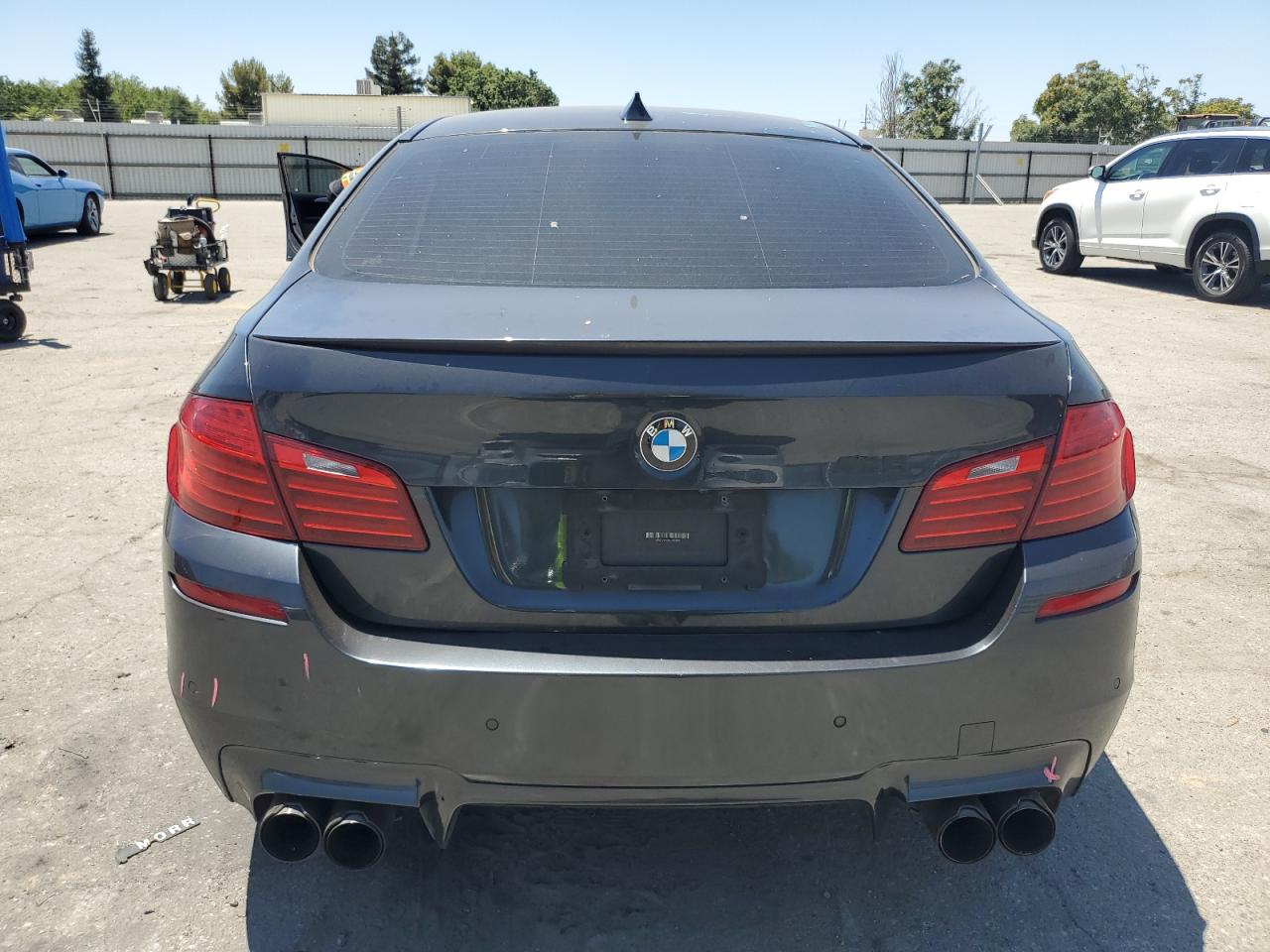 2014 BMW M5 VIN: WBSFV9C58ED592960 Lot: 63113575
