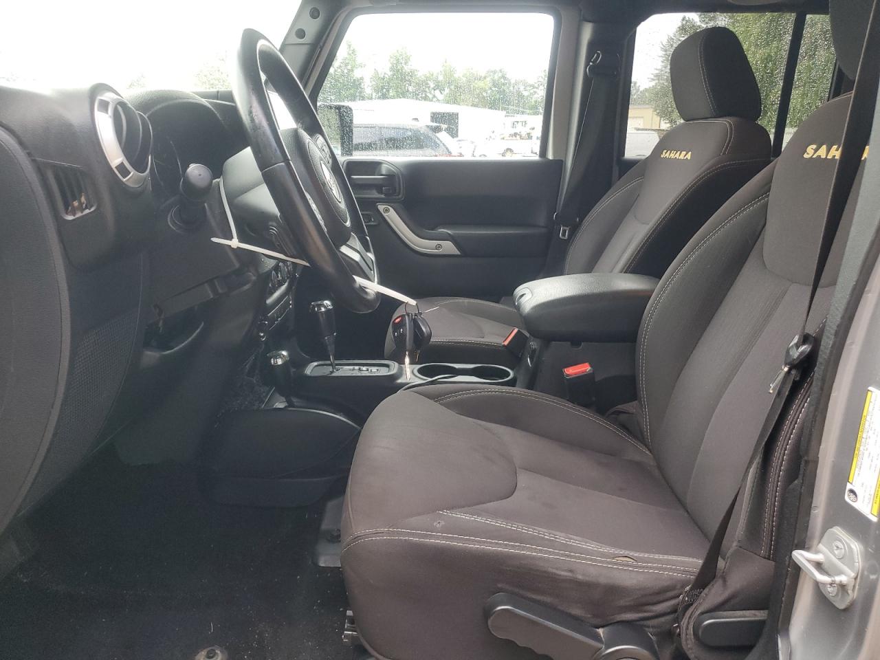 2014 Jeep Wrangler Unlimited Sahara VIN: 1C4BJWEG9EL142528 Lot: 63685315