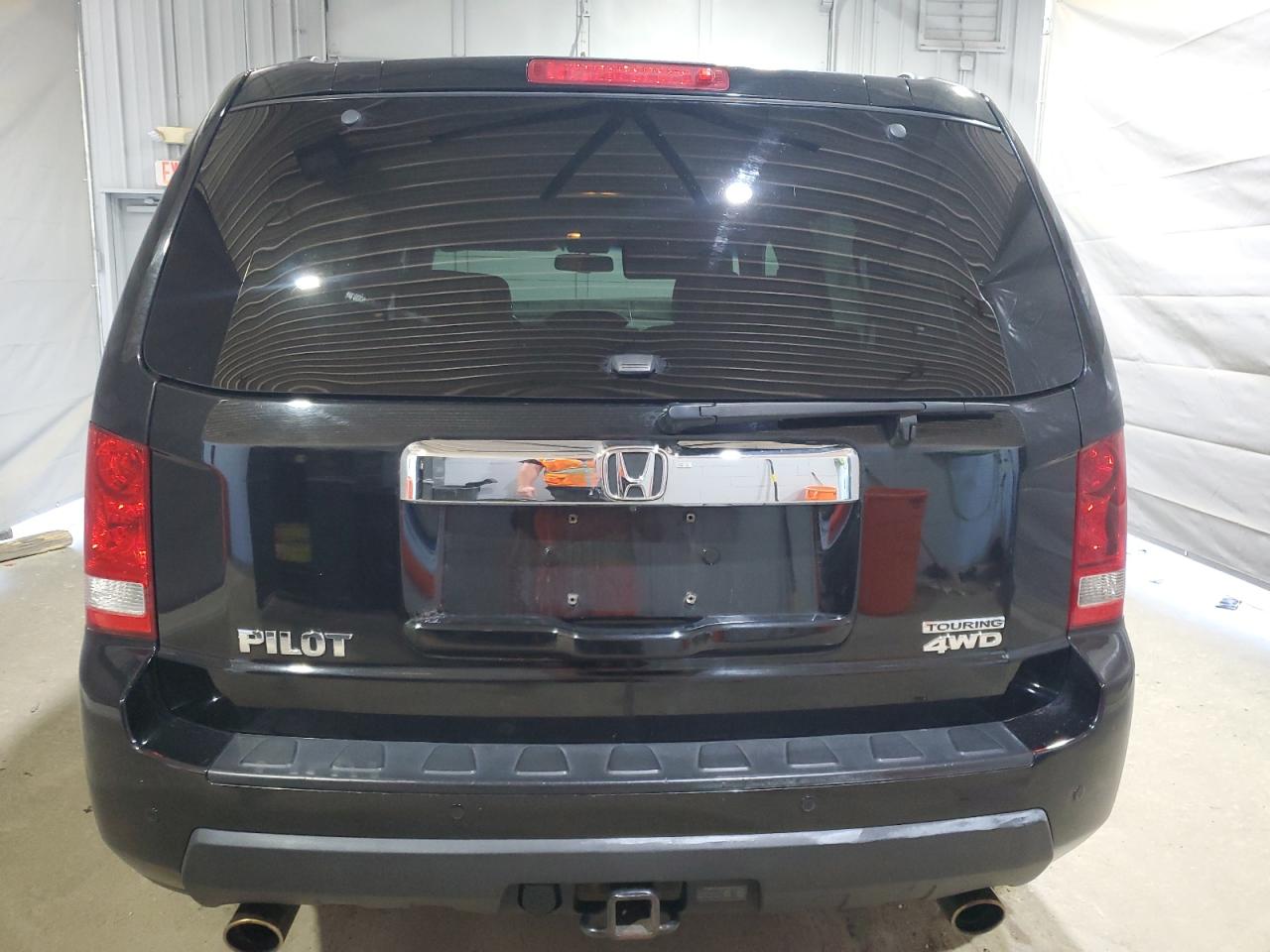 2010 Honda Pilot Touring VIN: 5FNYF4H91AB033815 Lot: 65589255