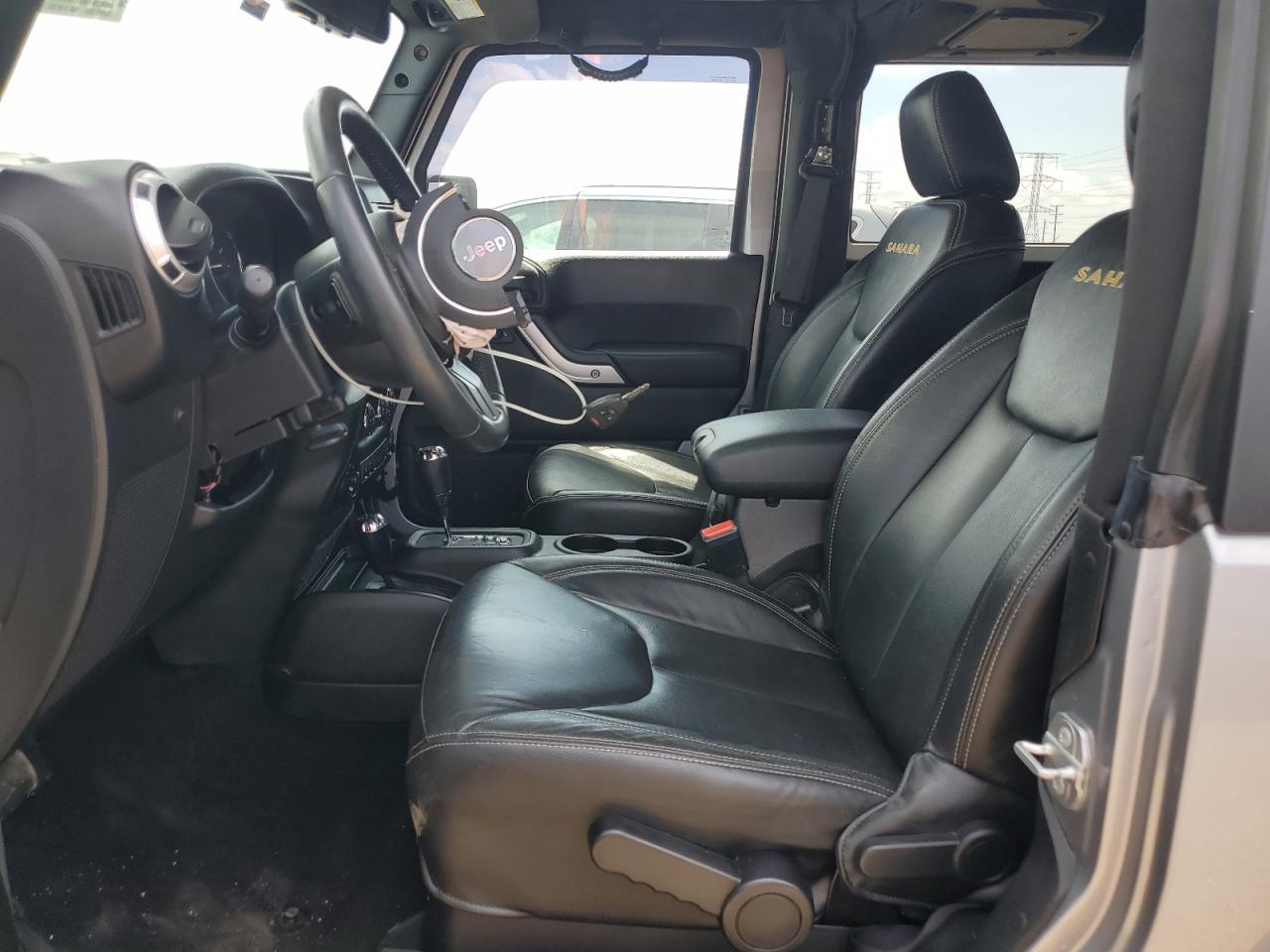 2016 Jeep Wrangler Sahara VIN: 1C4GJWBG9GL100518 Lot: 64752405
