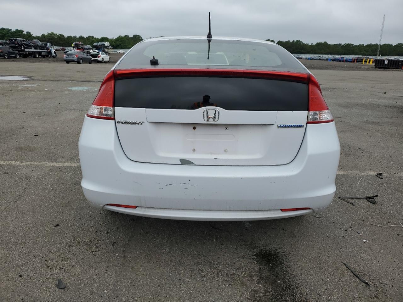 2010 Honda Insight Ex VIN: JHMZE2H72AS011043 Lot: 64619285