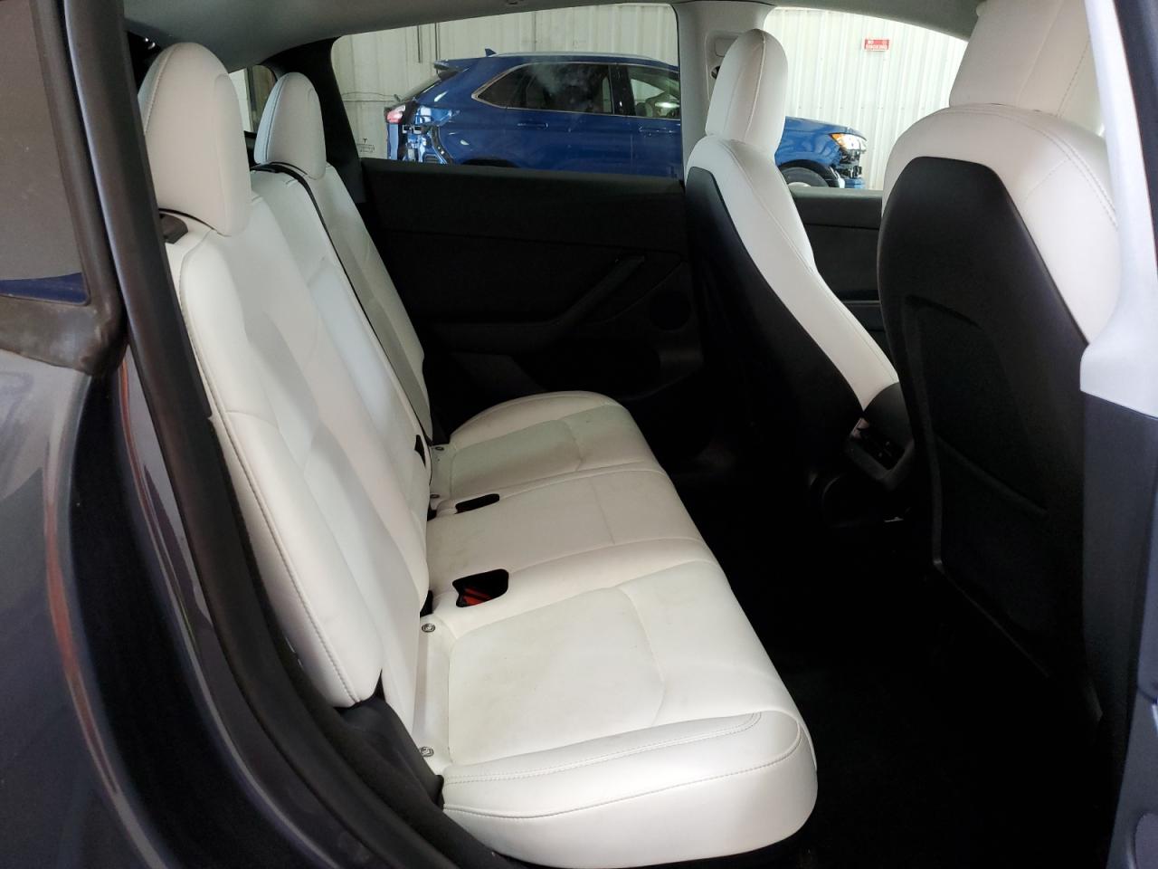 2023 Tesla Model Y VIN: 7SAYGDEF5PF595879 Lot: 65280985