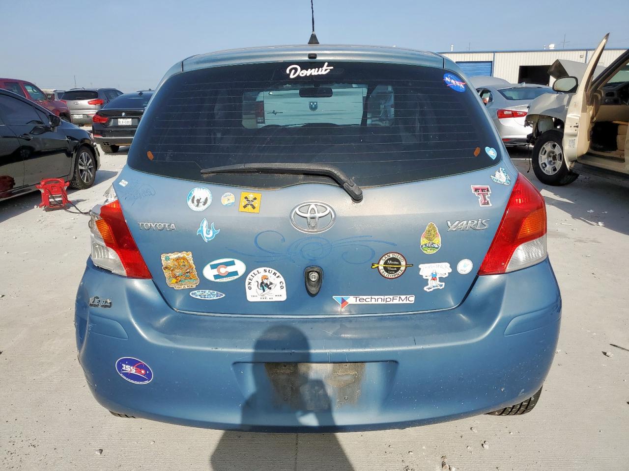 2009 Toyota Yaris VIN: JTDKT903895241920 Lot: 65417805