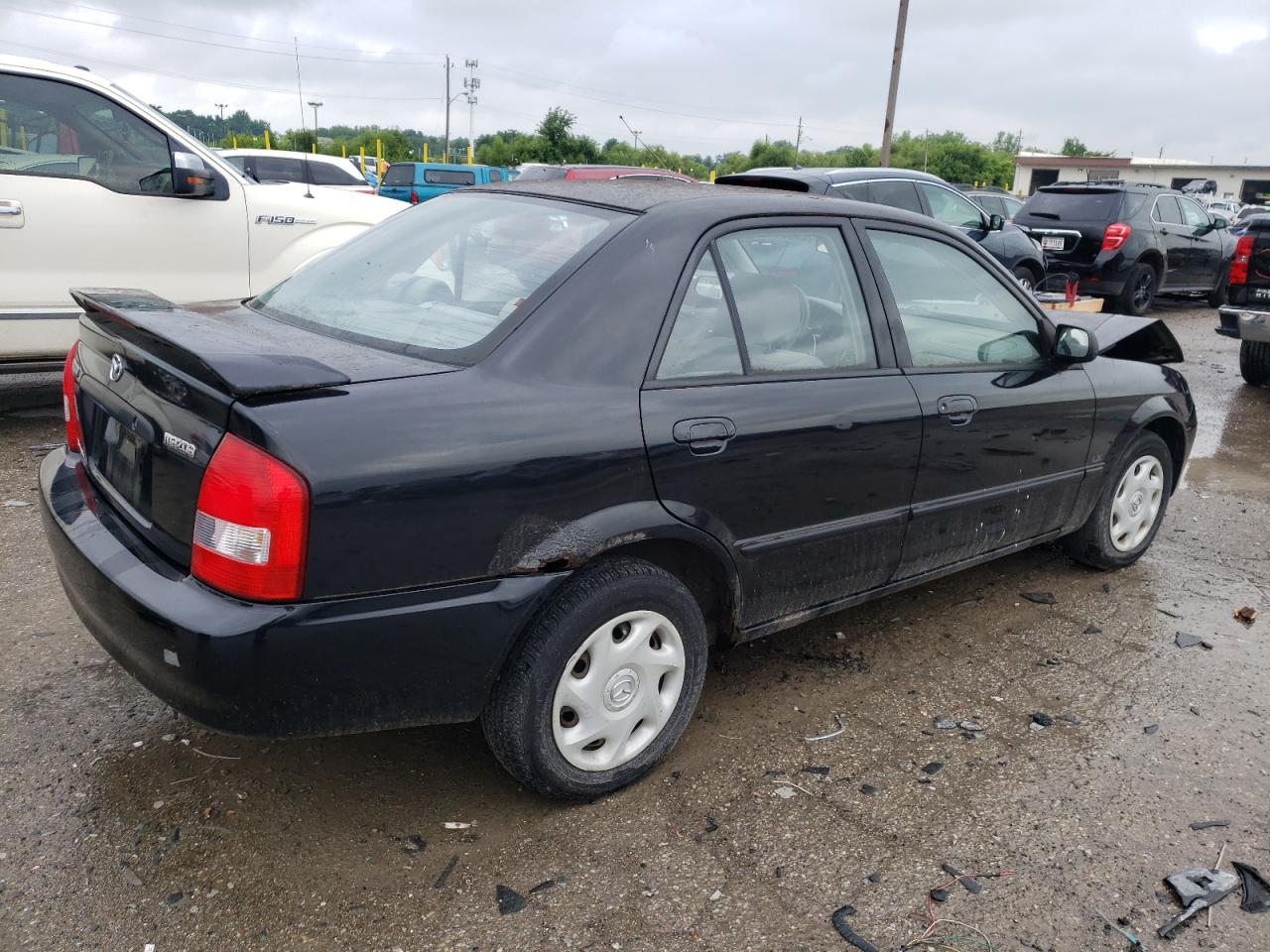 2001 Mazda Protege Dx VIN: JM1BJ222010414736 Lot: 65020415