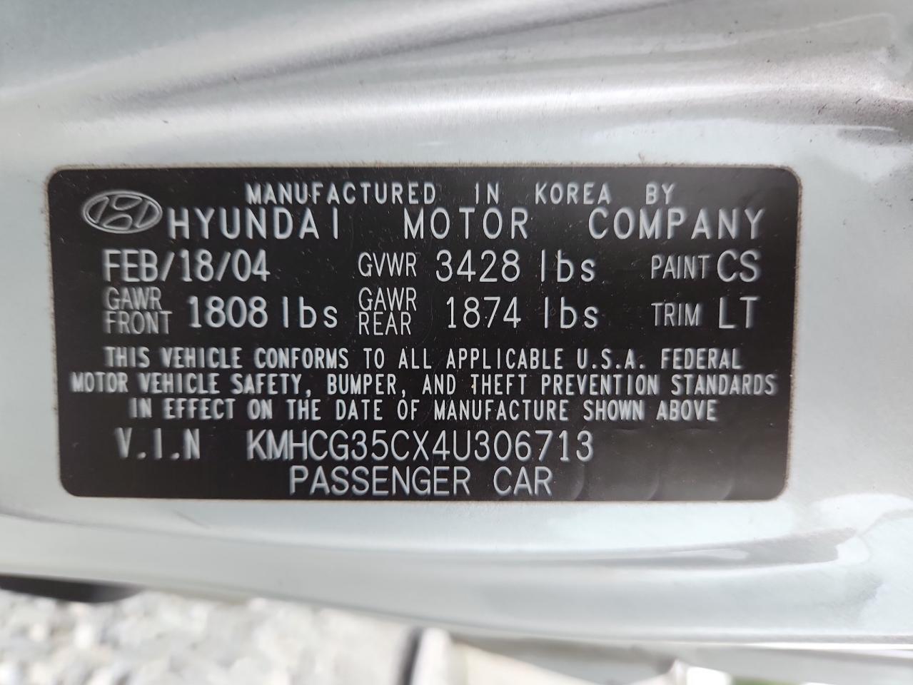2004 Hyundai Accent Gl VIN: KMHCG35CX4U306713 Lot: 64479445