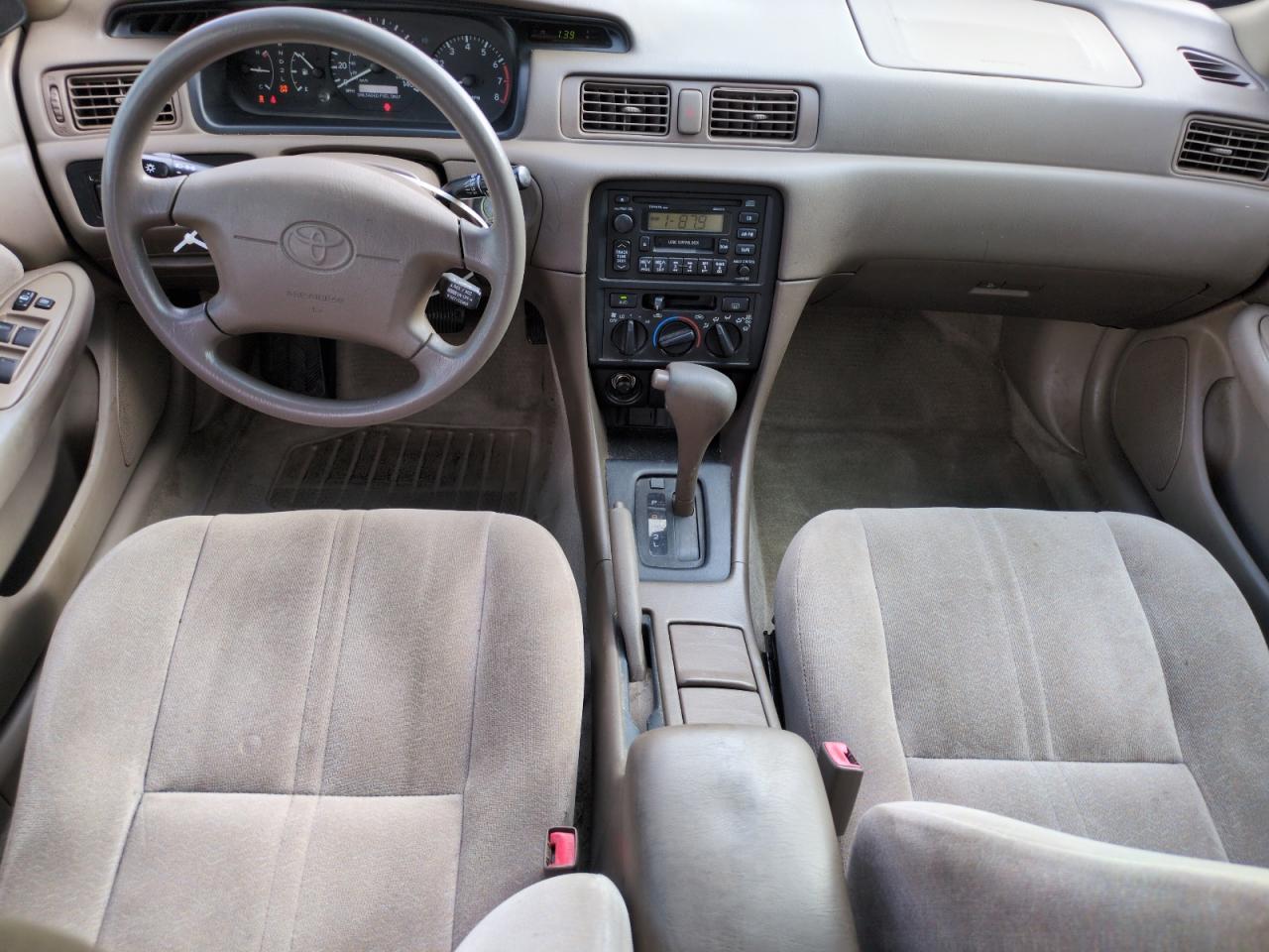 1999 Toyota Camry Le VIN: JT2BG28KXX0350213 Lot: 63525895