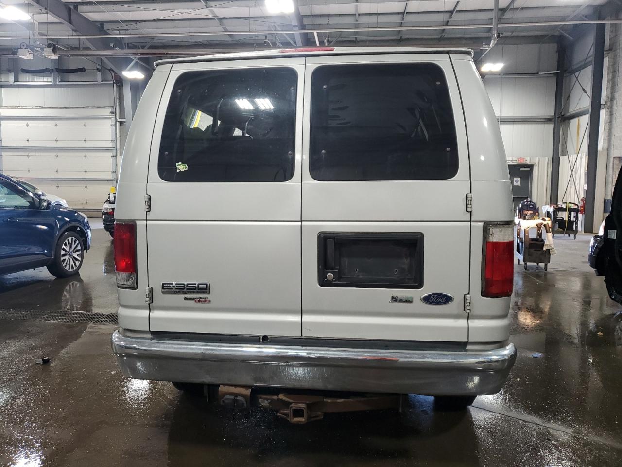 2010 Ford Econoline E350 Super Duty Wagon VIN: 1FBNE3BL1ADA73229 Lot: 64983575
