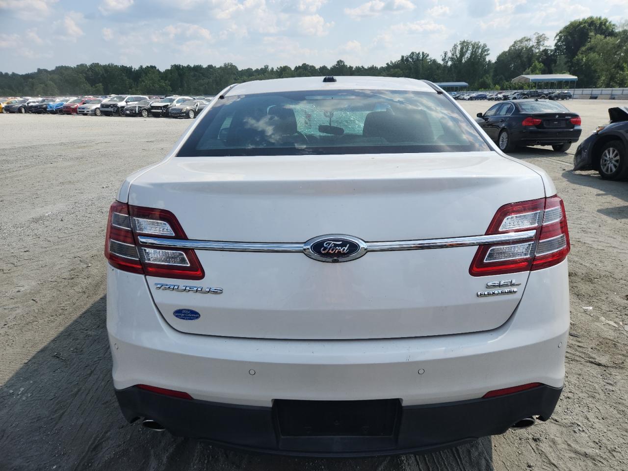 2015 Ford Taurus Sel VIN: 1FAHP2E83FG166656 Lot: 63603095