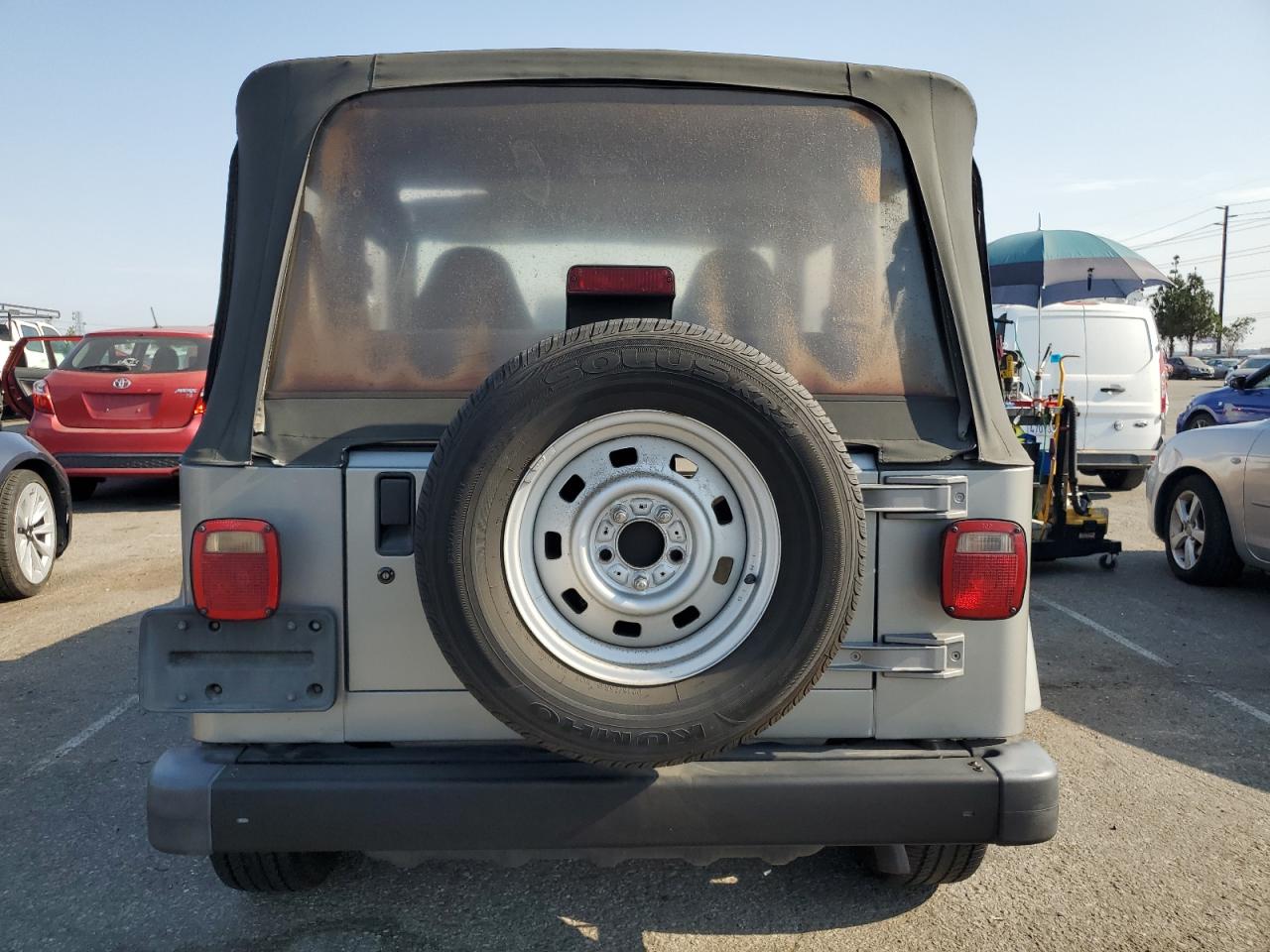 2000 Jeep Wrangler / Tj Se VIN: 1J4FA29P3YP770094 Lot: 65419385