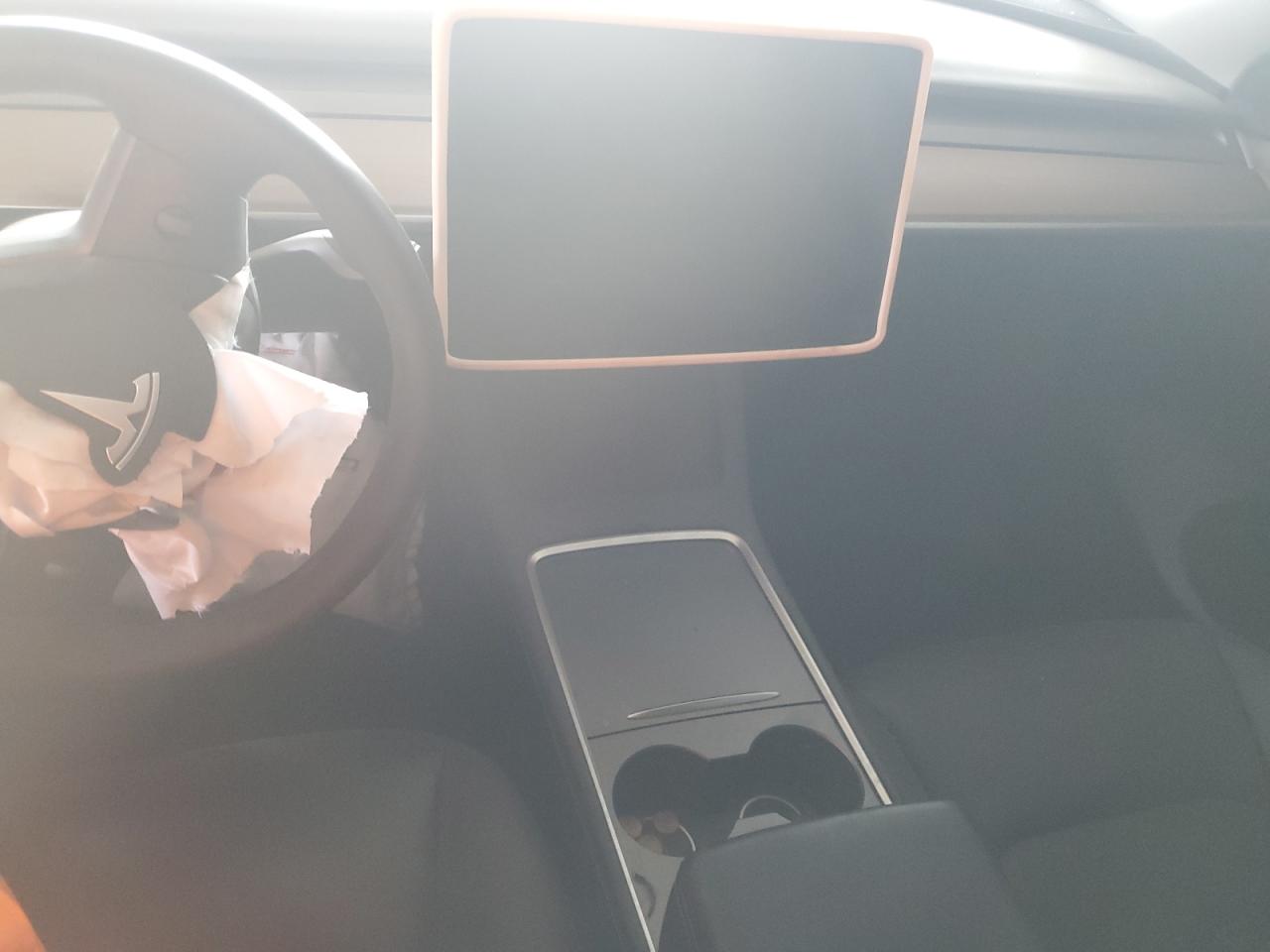 2023 Tesla Model Y VIN: 7SAYGDEE2PF870633 Lot: 63078765