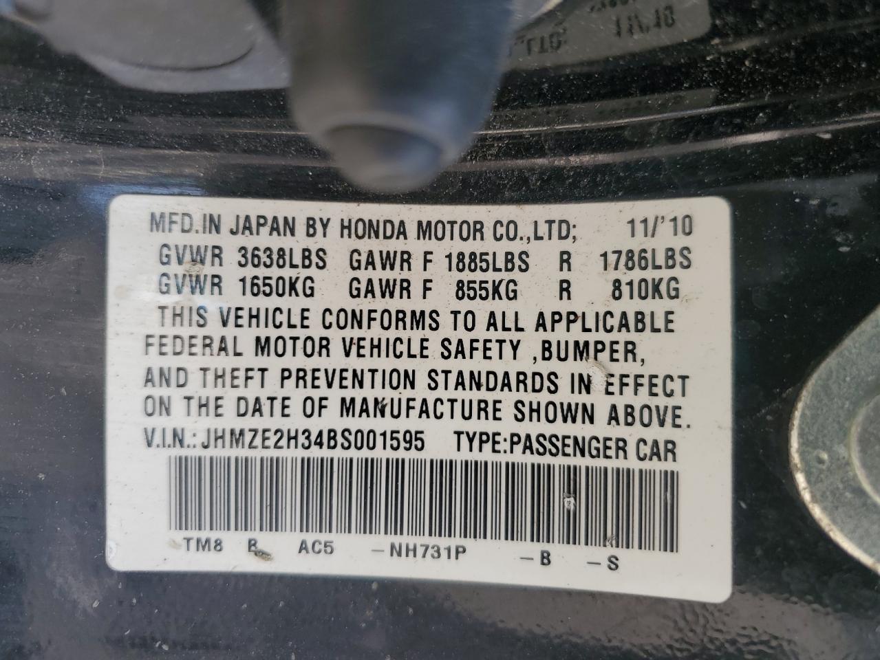 2011 Honda Insight VIN: JHMZE2H34BS001595 Lot: 63970425