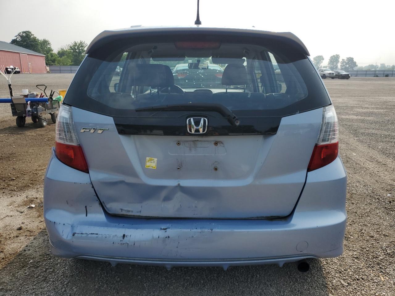 2009 Honda Fit Lx VIN: JHMGE88519S805617 Lot: 64778225